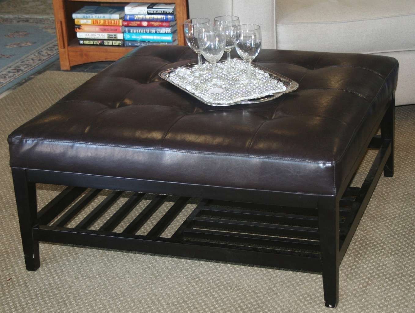 Most Up To Date Small Coffee Tables With Shelf Pertaining To Saving Small Lliving Room Spaces With Black Leather Tufted Ottoman (View 13 of 20)
