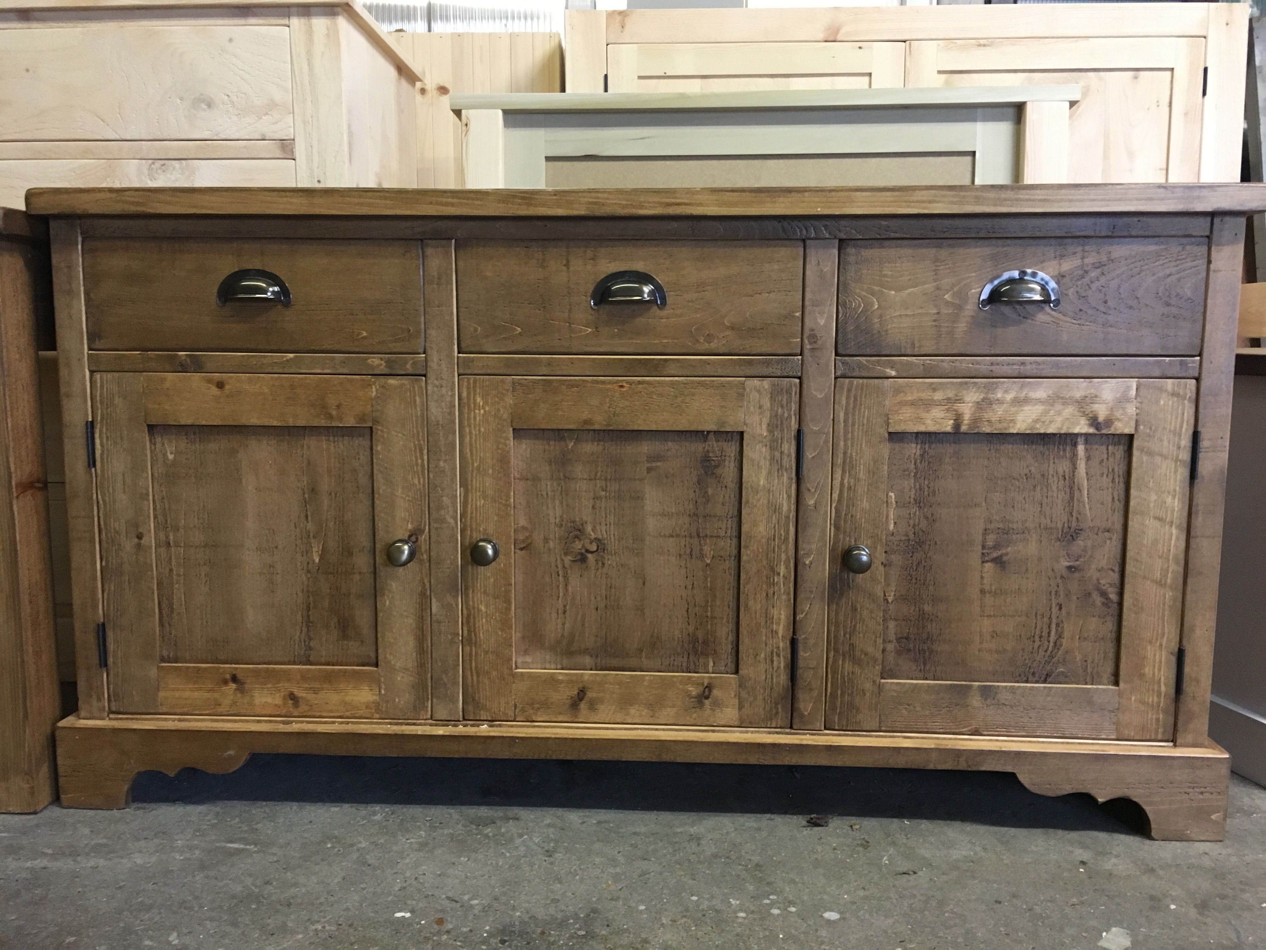 A Rustic Plank Sideboard With Slightly Different Cut Out Throughout Courtdale Sideboards (View 18 of 20)
