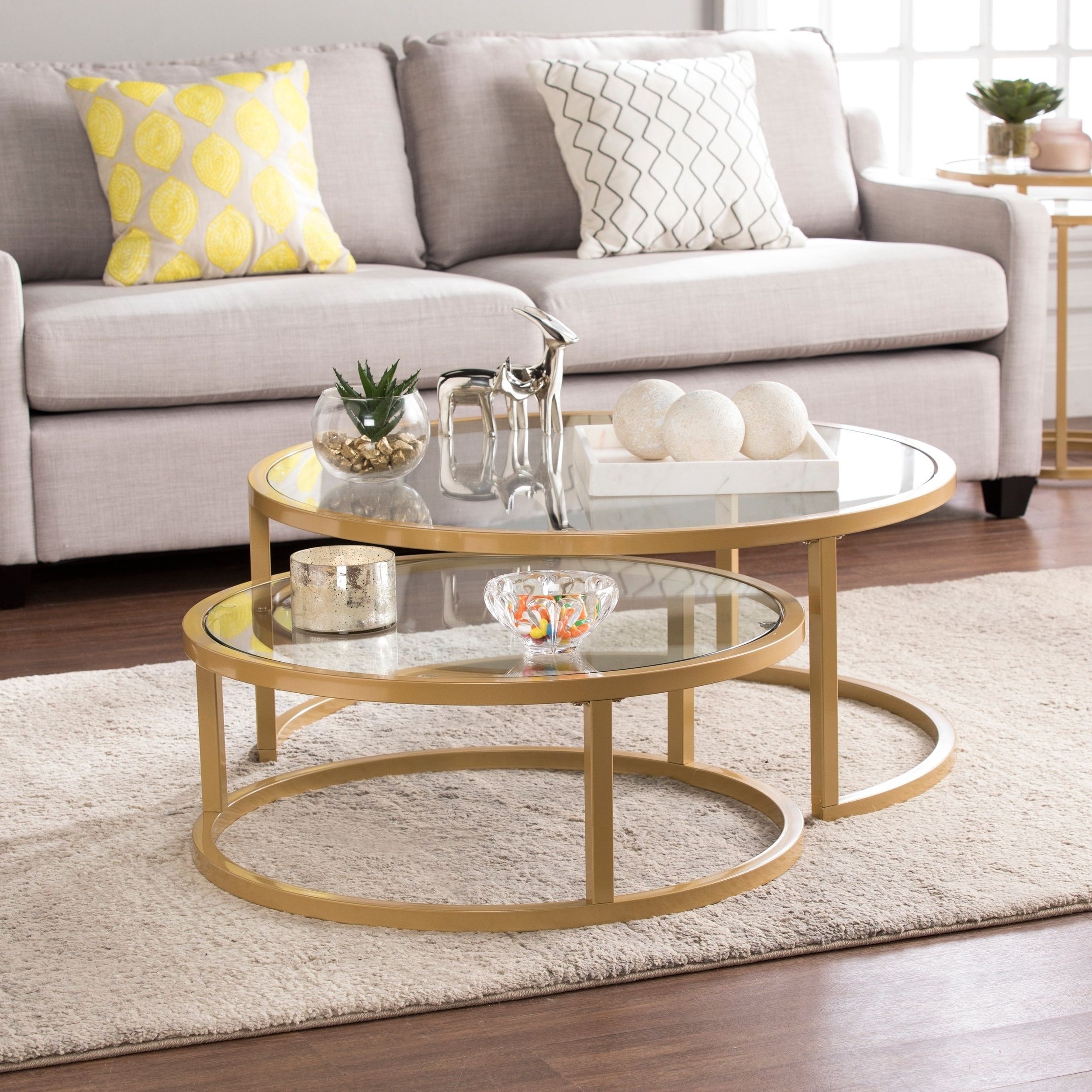 Round Glass Gold Steel Frame Nesting Cocktail Tables 2 Piece Inside Famous Silver Orchid Price Glass Coffee Tables (View 17 of 20)
