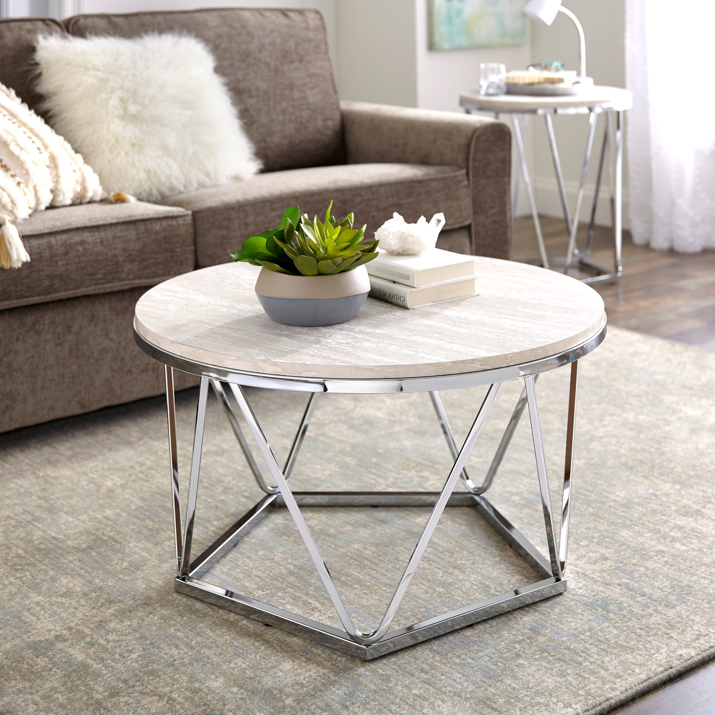 Silver Orchid Henderson Faux Stone Silvertone Round Coffee Table Within Well Known Silver Orchid Henderson Faux Stone Silvertone Round Coffee Tables (View 1 of 20)