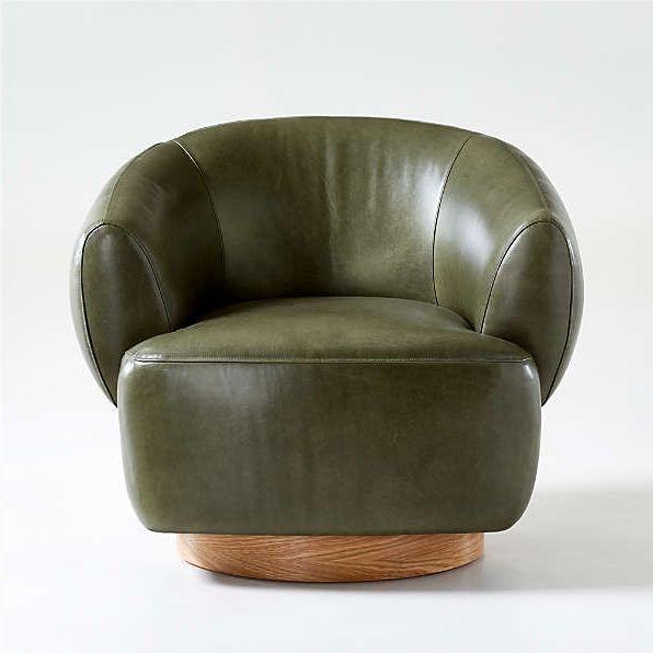 Swivel Seat Chairs | Crate And Barrel Within Hazley Faux Leather Swivel Barrel Chairs (View 13 of 20)