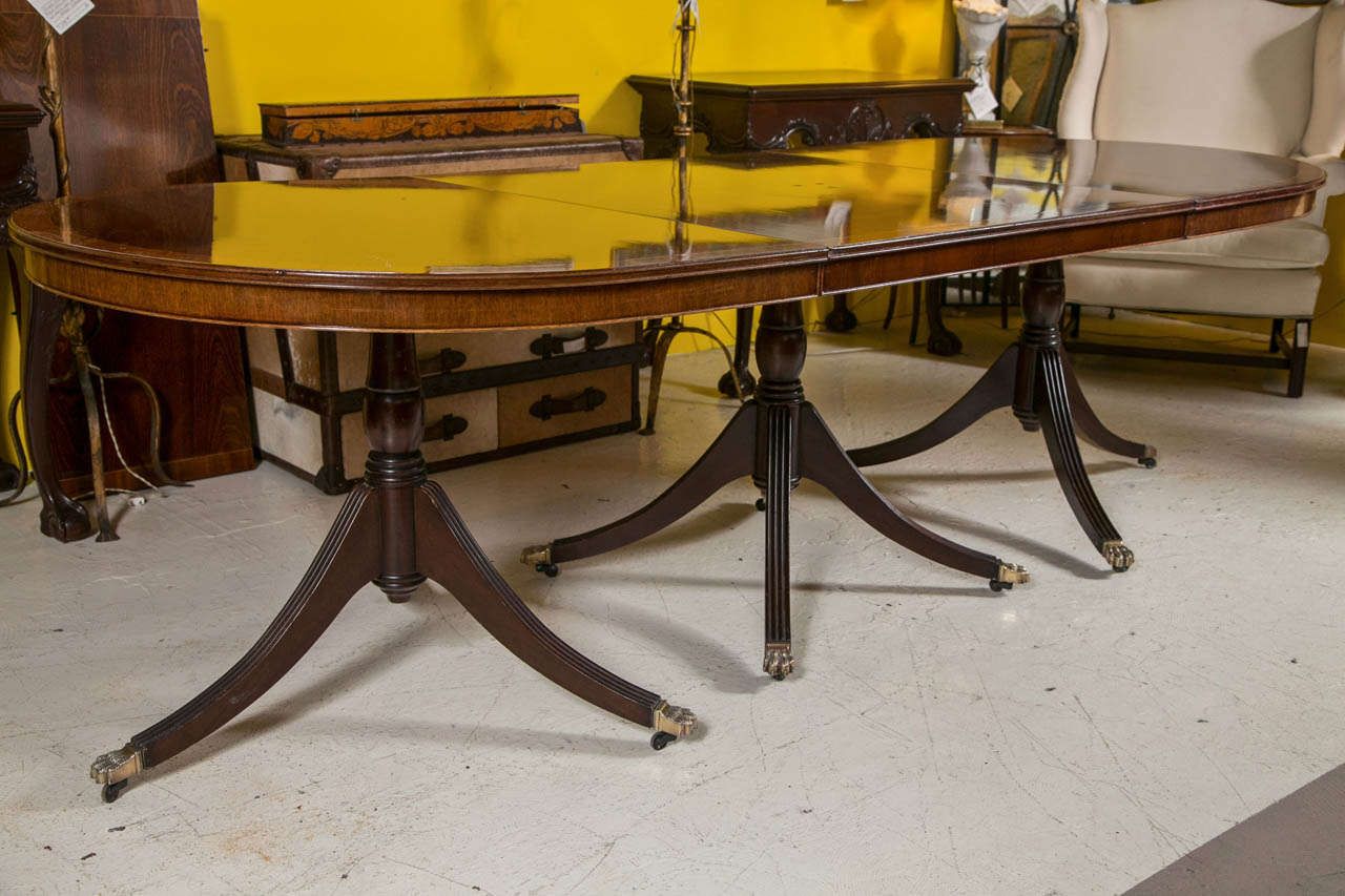 An English Georgian Style Triple Pedestal Banded Mahogany Regarding Fashionable 47'' Pedestal Dining Tables (View 18 of 20)