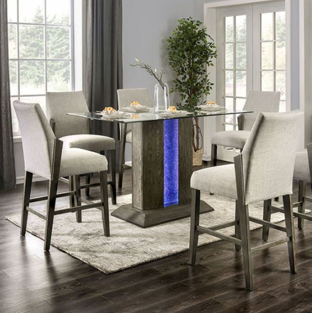 Popular Turton Ii Led Pedestal Counter Height Dining Table In Nakano Counter Height Pedestal Dining Tables (View 10 of 20)