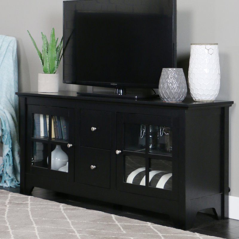 Featured Photo of 2024 Best of Modern Tv Stands in Oak Wood and Black Accents with Storage Doors