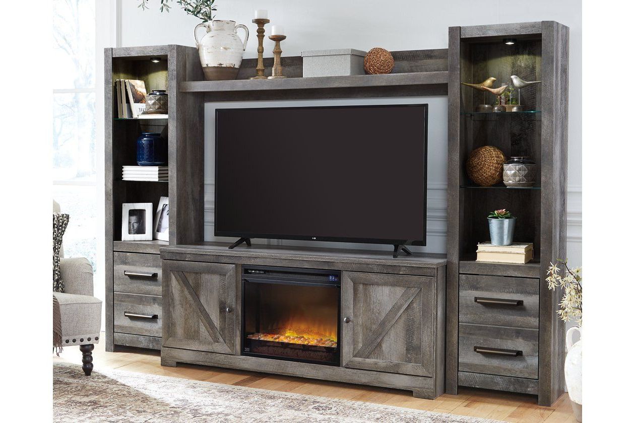 Wynnlow 4 Piece Entertainment Center With Electric Within Modern Farmhouse Fireplace Credenza Tv Stands Rustic Gray Finish (View 9 of 20)