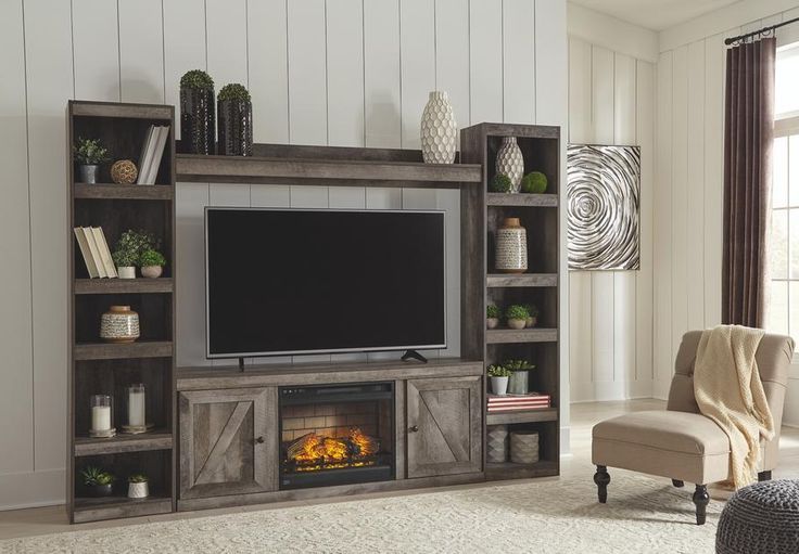 Wynnlow 4piece Entertainment Center With Electric Intended For Modern Farmhouse Fireplace Credenza Tv Stands Rustic Gray Finish (View 12 of 20)