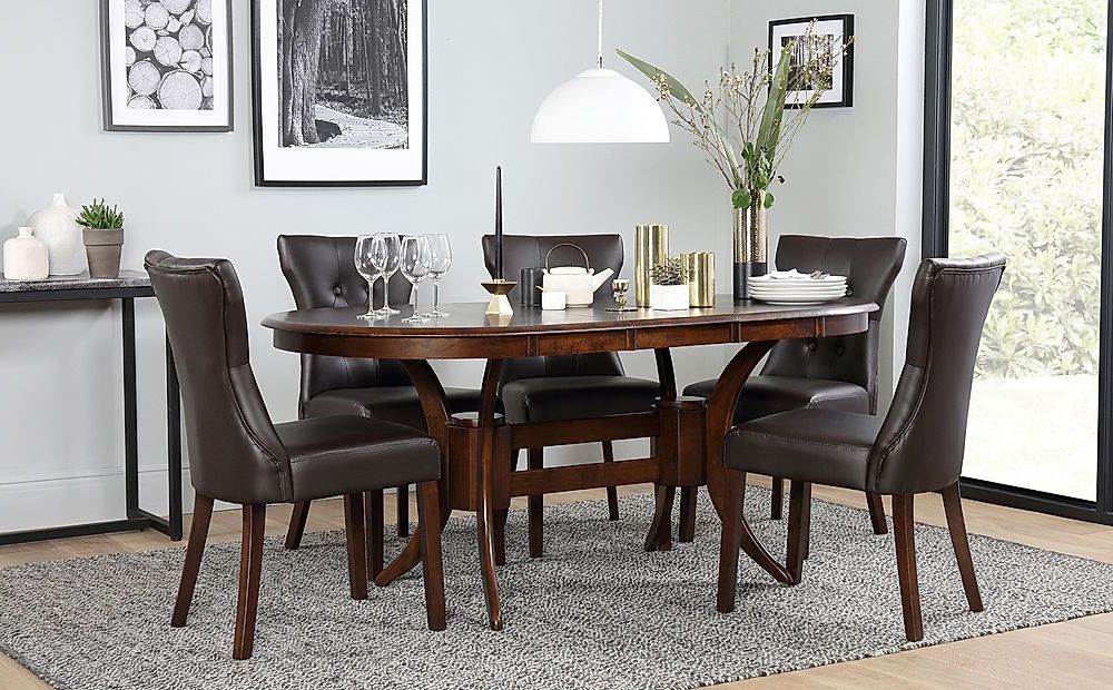 Popular Brown Dining Tables With Townhouse Oval Dark Wood Extending Dining Table With  (View 13 of 20)