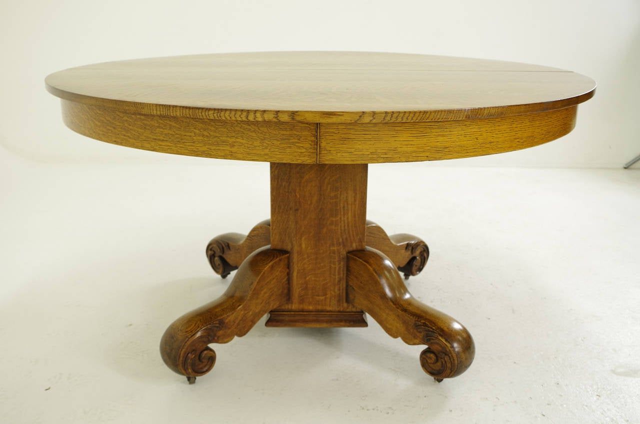 Round Oak Split Pedestal Dining Table With Four Leaves Pertaining To Favorite Round Pedestal Dining Tables With One Leaf (View 17 of 20)