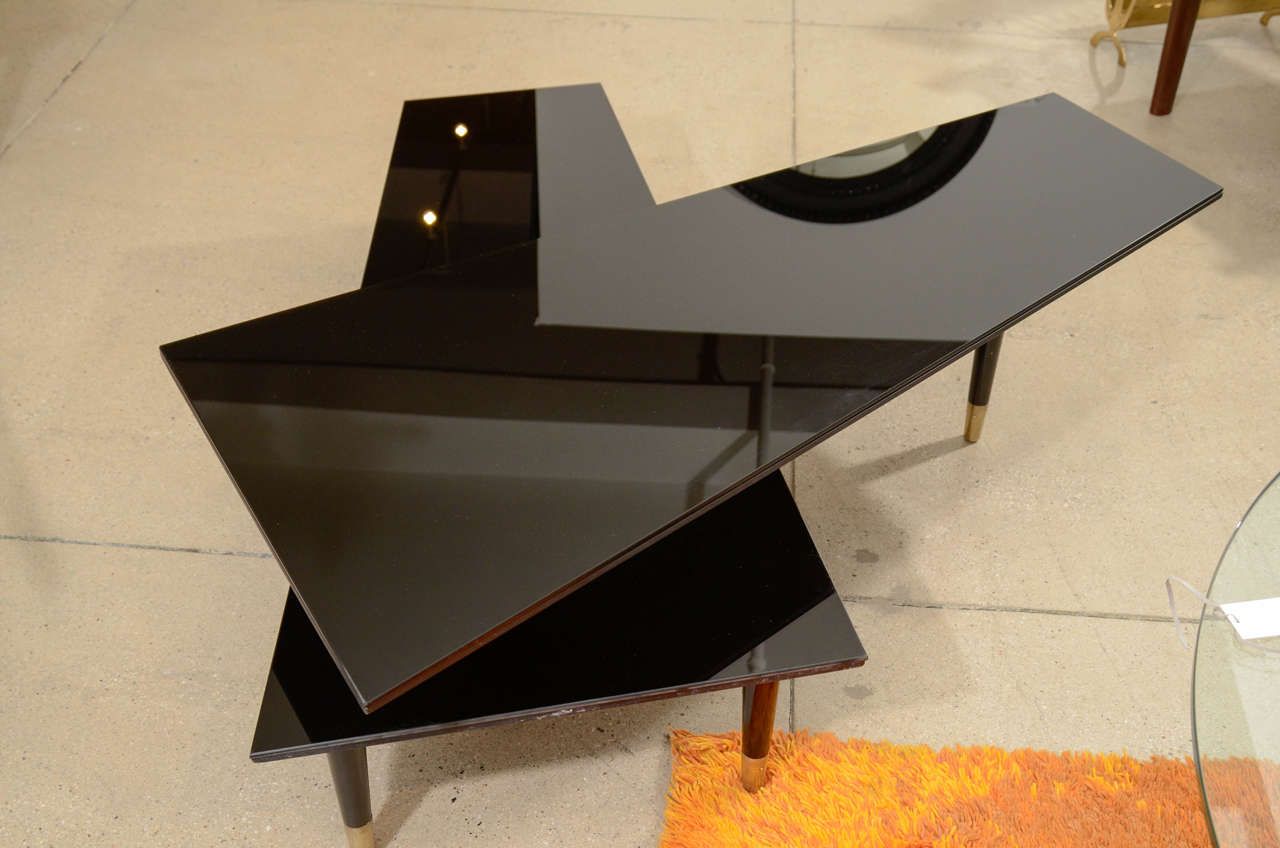 Mid Century Black Mirrored Multi Directional Cocktail Intended For Well Liked Mirrored And Chrome Modern Cocktail Tables (View 7 of 20)