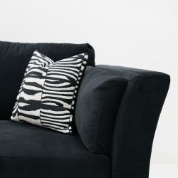 Ashmore Corner 3s+chaise+ottoman Black Fabric Intended For Black Fabric Ottomans With Fringe Trim (View 18 of 20)