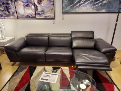 Avanti Modern Reclining Sofa | Modern Furniture Cleveland | Designers Throughout Espresso Faux Leather Ac And Usb Ottomans (View 2 of 20)