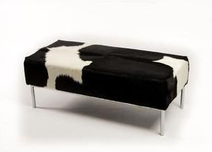 Black & White Cowhide Ottoman With Metal Rail Base 110x50x40cm In White Solid Cylinder Pouf Ottomans (View 10 of 20)