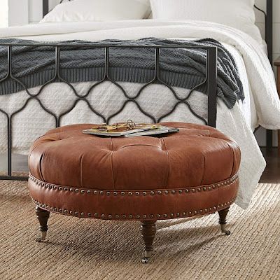 Button Tufted Round Leather Wheeled Ottoman With Spindled Wooden Legs Throughout Wooden Legs Ottomans (View 2 of 20)