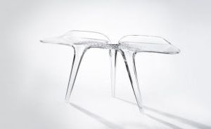 Zaha Hadid's Final Furniture Collection Deals In Walnut, Silver And Inside Silver And Acrylic Console Tables (View 13 of 20)