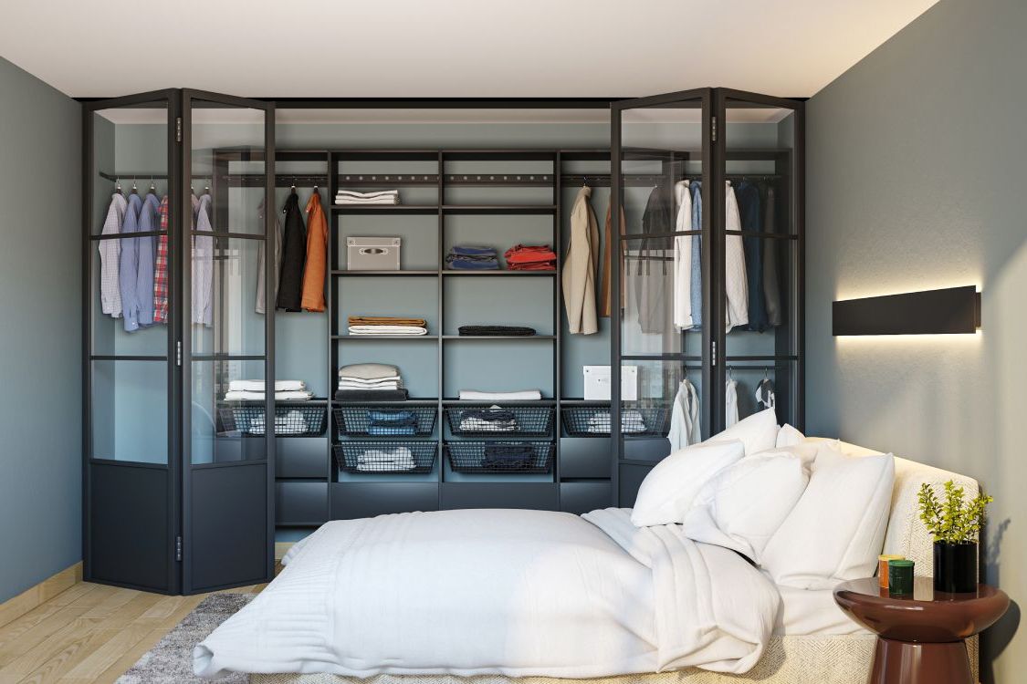 Black Sliding And Folding Wardrobe Design | Livspace With Regard To Industrial Style Wardrobes (View 14 of 20)