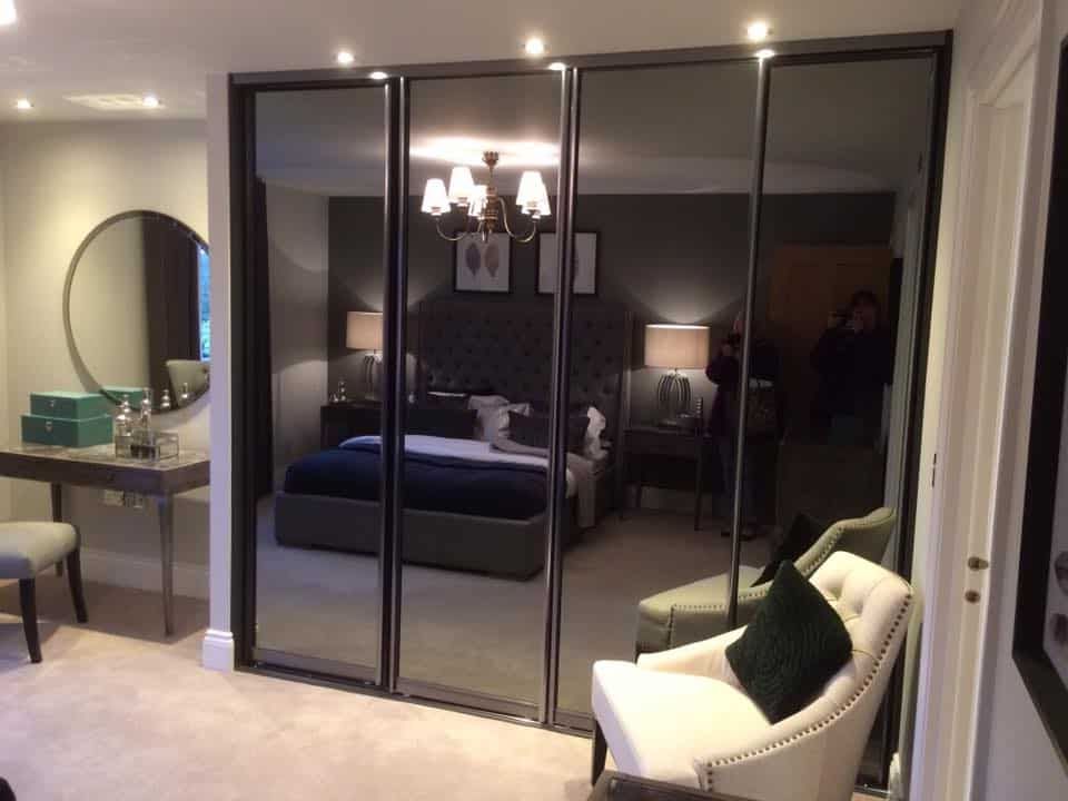 Glass Sliding Wardrobes | Mirrored Fitted Wardrobes | Glide & Slide In Black Glass Wardrobes (Gallery 13 of 20)