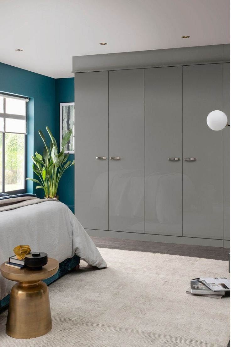 Grey Fitted Wardrobes Go Perfectly With Bedroom Wall Painted In Classic  Blue (View 8 of 20)