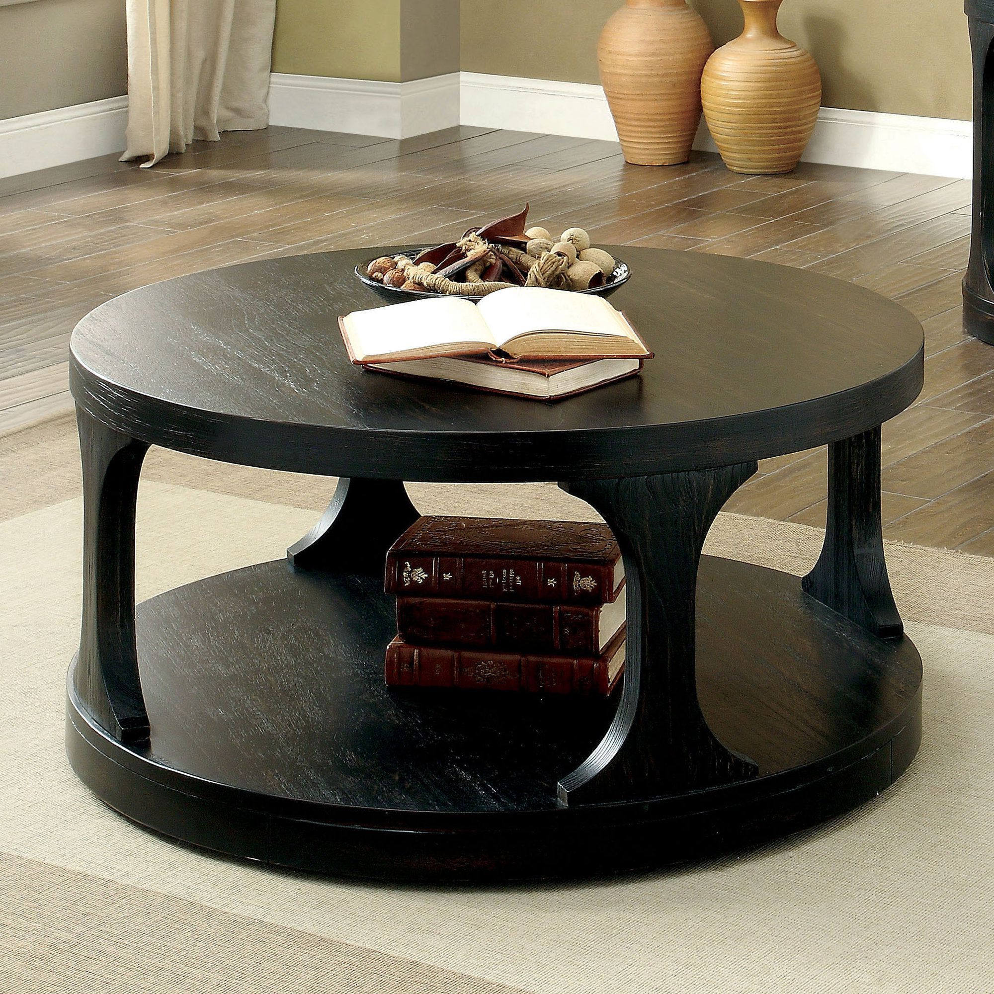 Bring A Touch Of Elegance To Your Home With A Black Circle Coffee Table Inside Full Black Round Coffee Tables (View 9 of 20)