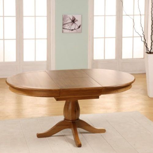 Round Dining Tables Extends To Oval (Photo 2 of 20)