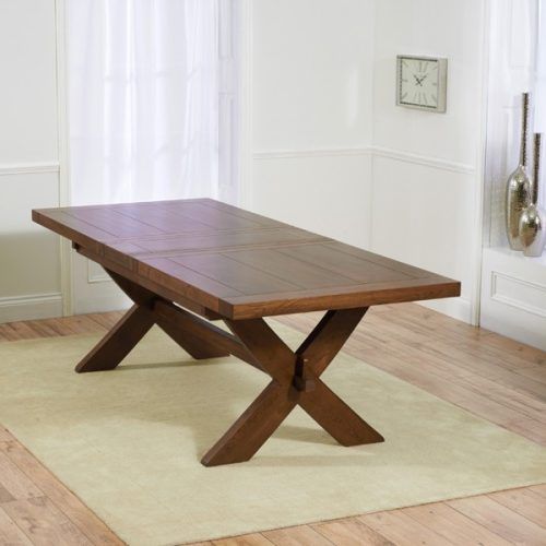 Dark Wood Extending Dining Tables (Photo 18 of 20)