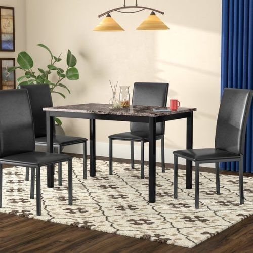 Caira Black 5 Piece Round Dining Sets With Upholstered Side Chairs (Photo 6 of 20)