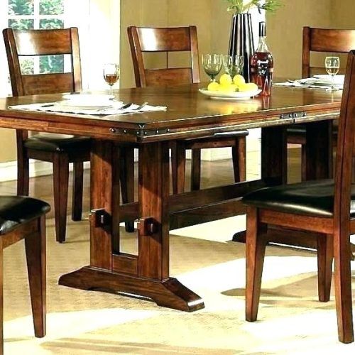 Dark Solid Wood Dining Tables (Photo 12 of 20)