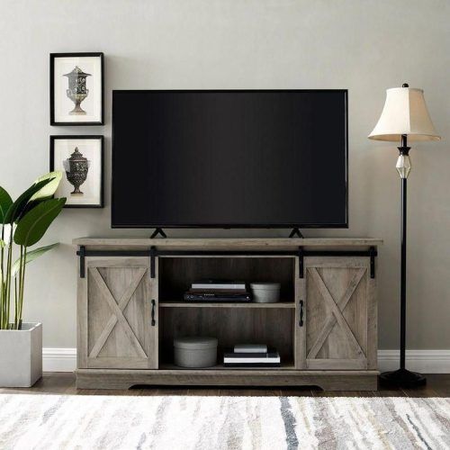Modern Farmhouse Style 58" Tv Stands With Sliding Barn Door (Photo 10 of 20)