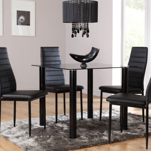 Round Black Glass Dining Tables And Chairs (Photo 16 of 20)