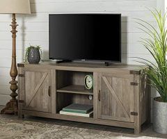 Top 20 of Jaxpety 58" Farmhouse Sliding Barn Door Tv Stands in Rustic Gray