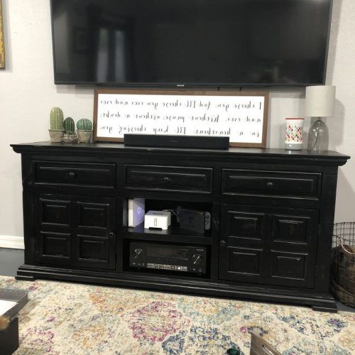 Modern Tv Stands In Oak Wood And Black Accents With Storage Doors (Photo 10 of 20)