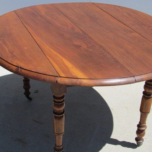Vintage Brown Round Dining Tables (Photo 14 of 20)