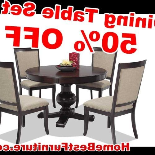 Caira Black 5 Piece Round Dining Sets With Upholstered Side Chairs (Photo 7 of 20)