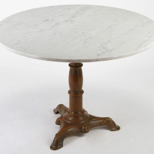 Reclaimed Teak And Cast Iron Round Dining Tables (Photo 12 of 20)