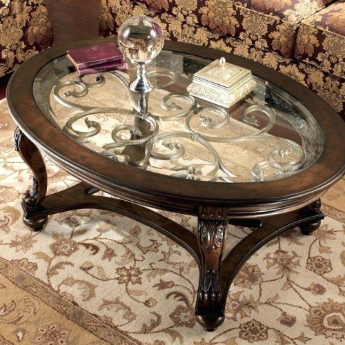 Winslet Cherry Finish Wood Oval Coffee Tables With Casters (Photo 19 of 20)