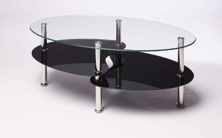 20 Collection of Oval Black Glass Coffee Tables