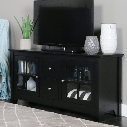 Modern Tv Stands In Oak Wood And Black Accents With Storage Doors (Photo 1 of 20)