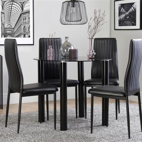 Round Black Glass Dining Tables And Chairs (Photo 11 of 20)