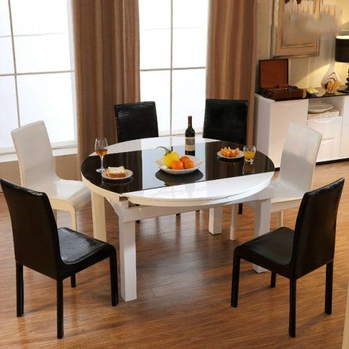 Round Glass And Oak Dining Tables (Photo 20 of 20)