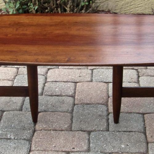 Winslet Cherry Finish Wood Oval Coffee Tables With Casters (Photo 7 of 20)