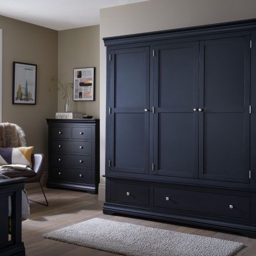 Dark Wood Wardrobes With Drawers (Photo 1 of 20)