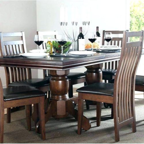 Solid Dark Wood Dining Tables (Photo 10 of 20)